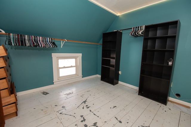 1153 Dexter Rd, Dover-Foxcroft, ME 04426 - walk in closet featuring vaulted ceiling