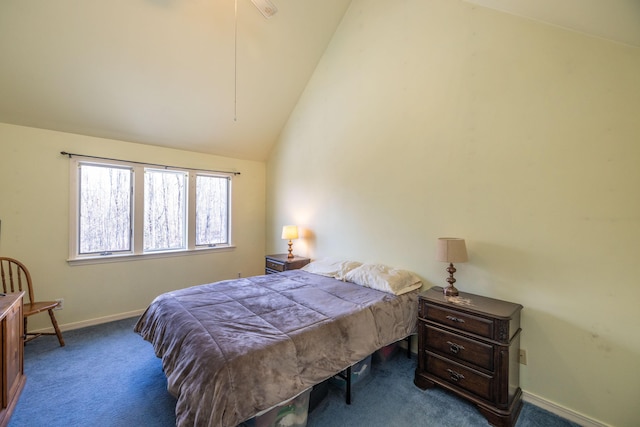 bedroom featuring carpet and vaulted ceiling