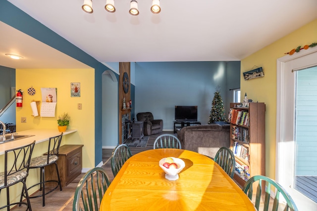 dining space with hardwood / wood-style flooring