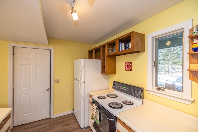 kitchen with dark wood-type flooring and white electric range oven