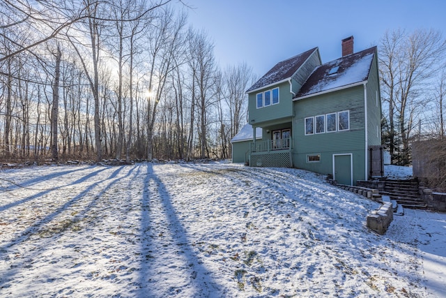 view of snow covered property