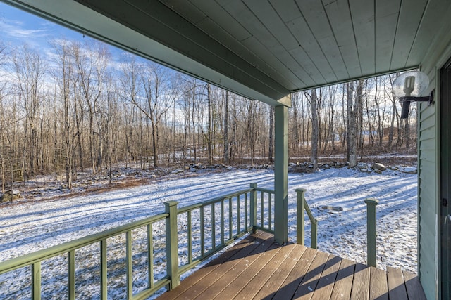 view of snow covered deck