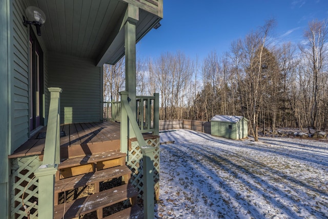 view of snow covered deck