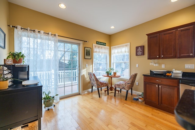 dining room with light hardwood / wood-style floors