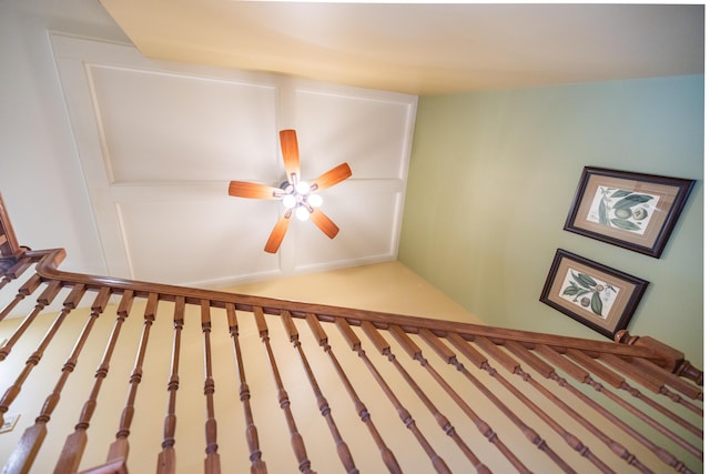 stairs with ceiling fan