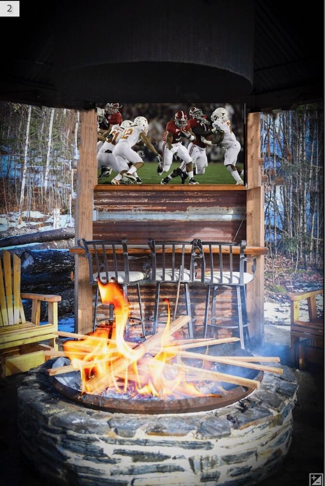 154 Old Brownville Rd, Sebec, ME 04481 - exterior view of a fire pit