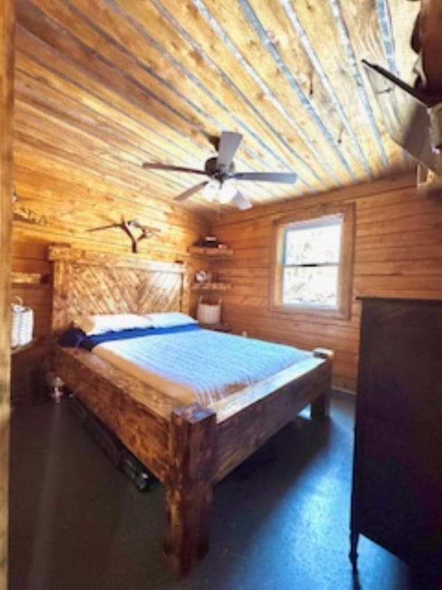154 Old Brownville Rd, Sebec, ME 04481 - bedroom with wood walls and wooden ceiling