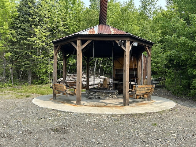 154 Old Brownville Rd, Sebec, ME 04481 - view of patio / terrace with a gazebo and a view of trees
