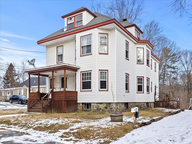 victorian-style house with a porch