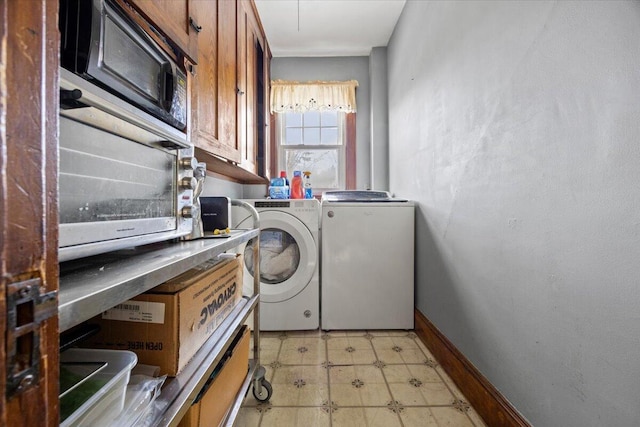 laundry room featuring independent washer and dryer