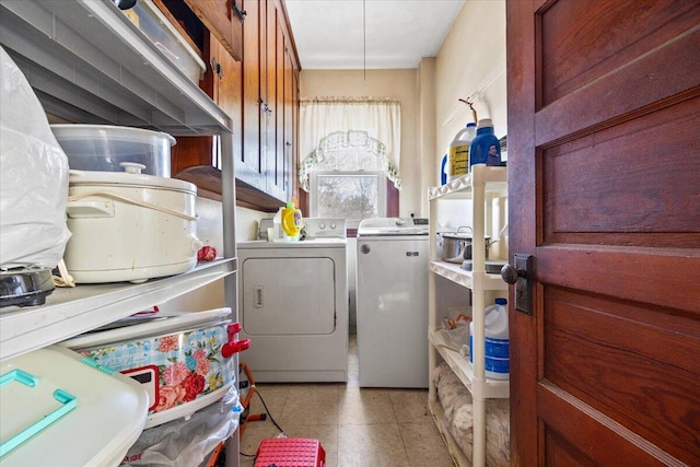 washroom with independent washer and dryer