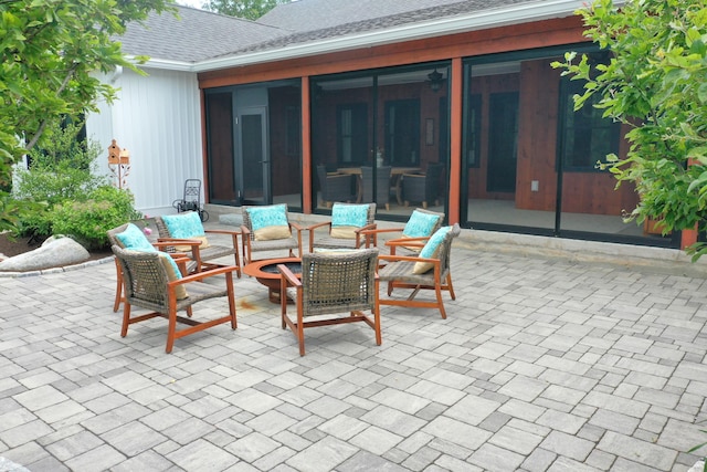 view of patio / terrace with a sunroom