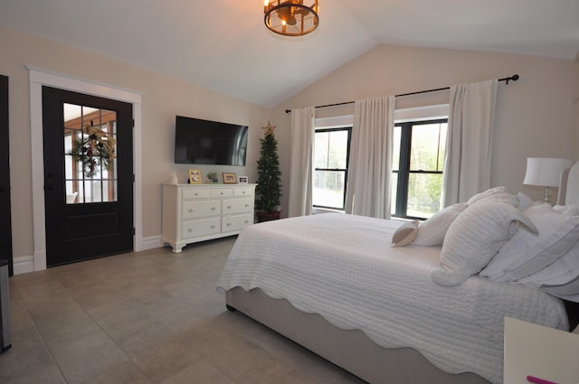 bedroom with lofted ceiling