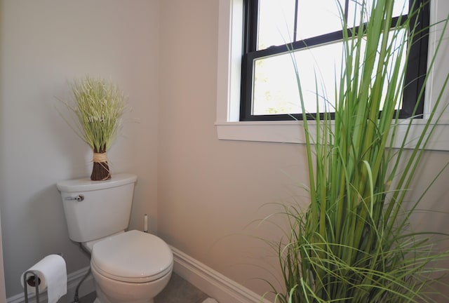 bathroom featuring toilet