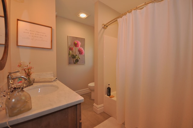 full bathroom featuring tile patterned flooring, vanity, toilet, and shower / bathtub combination with curtain