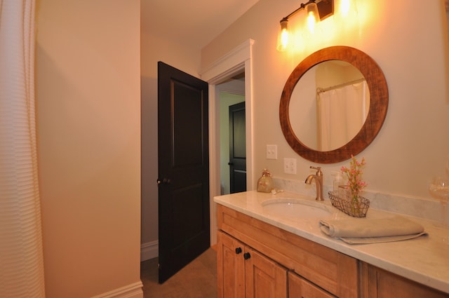 bathroom with tile patterned floors and vanity