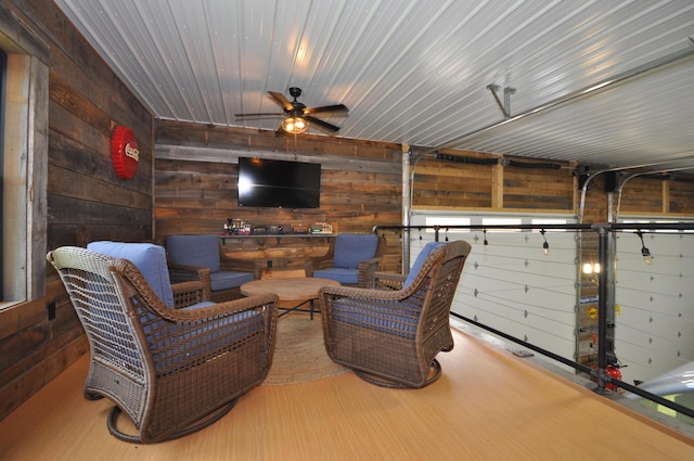 view of patio featuring ceiling fan and an outdoor living space