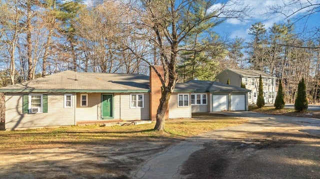 single story home with a garage