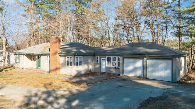 single story home with a garage