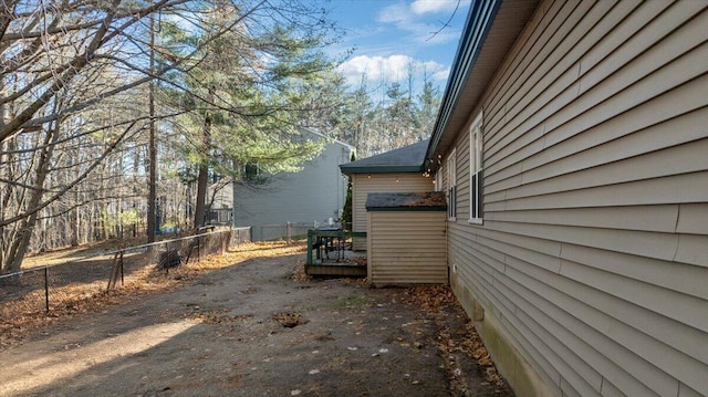 view of property exterior featuring a deck