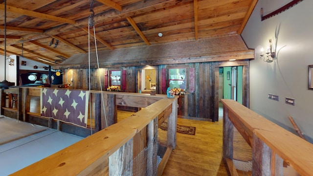 hall featuring wood ceiling, wood-type flooring, and vaulted ceiling with beams