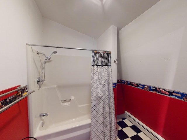 bathroom with shower / bath combination with curtain, a baseboard radiator, and vaulted ceiling