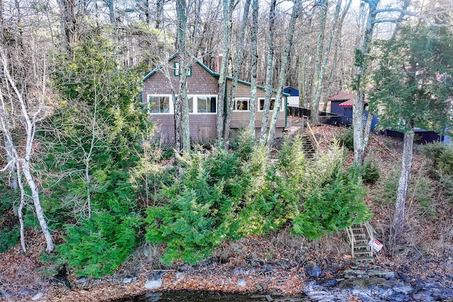 exterior space featuring a wooden deck