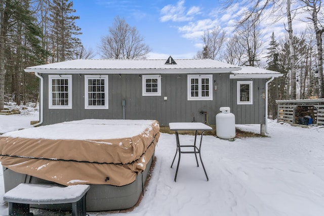 view of snow covered house