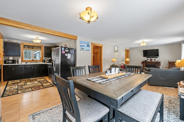 dining room featuring light hardwood / wood-style flooring