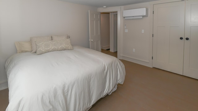 20 N High St, Bridgton, ME 04009 - bedroom featuring a wall mounted air conditioner and a closet