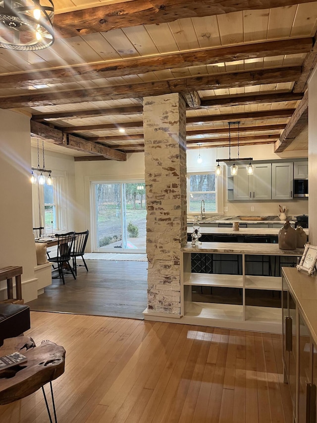20 N High St, Bridgton, ME 04009 - interior space with beamed ceiling, wooden ceiling, and hardwood / wood-style floors