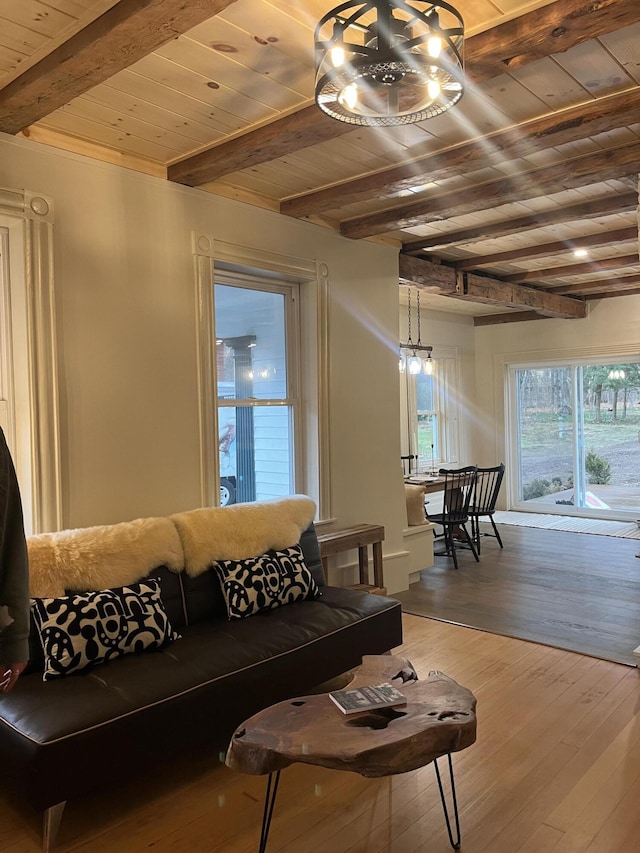20 N High St, Bridgton, ME 04009 - living room with beam ceiling, hardwood / wood-style flooring, and wood ceiling