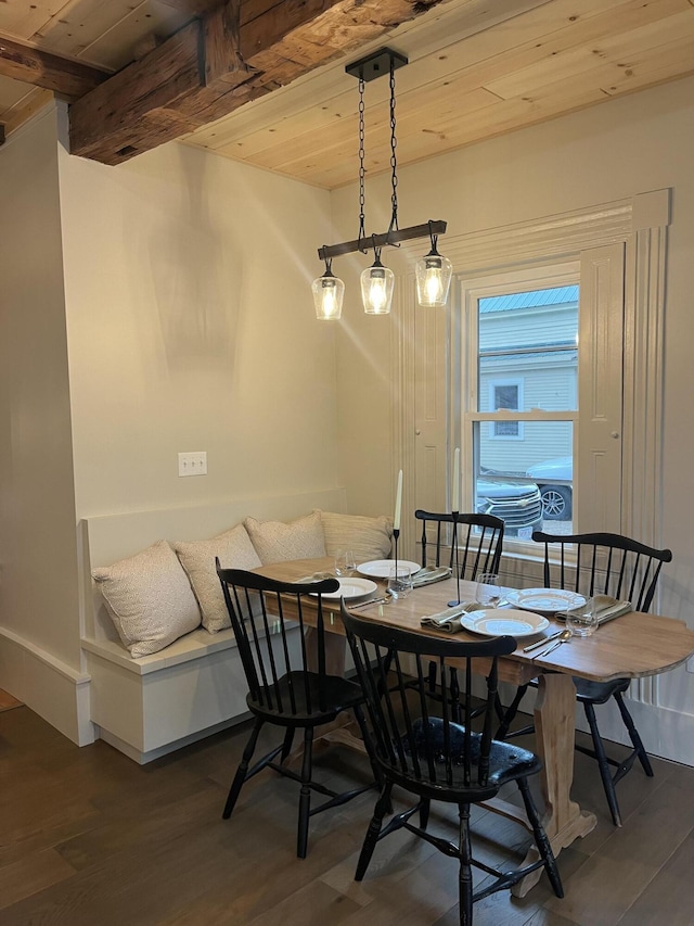 20 N High St, Bridgton, ME 04009 - dining room with beamed ceiling, dark hardwood / wood-style flooring, and wooden ceiling