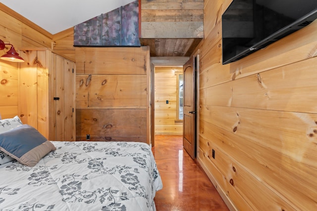 18 Severin Way, Limerick, ME 04048 - bedroom with wood walls, lofted ceiling, and wood finished floors