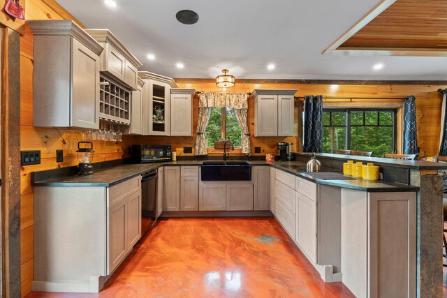 18 Severin Way, Limerick, ME 04048 - kitchen featuring a peninsula, recessed lighting, dark countertops, dishwasher, and concrete flooring