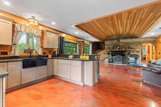 18 Severin Way, Limerick, ME 04048 - kitchen featuring open floor plan, lofted ceiling, wood ceiling, plenty of natural light, and arched walkways