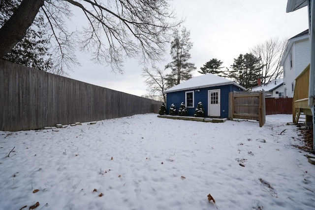 view of yard layered in snow