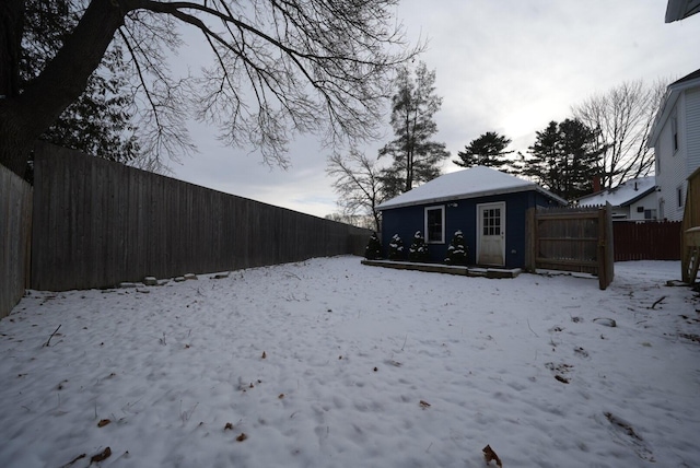 view of yard layered in snow