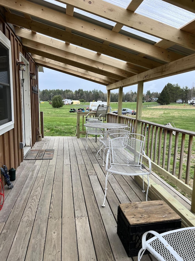 wooden terrace with a rural view