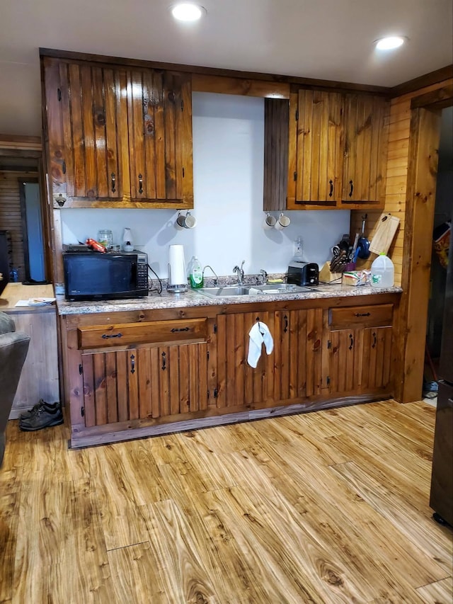 kitchen featuring sink and light hardwood / wood-style floors