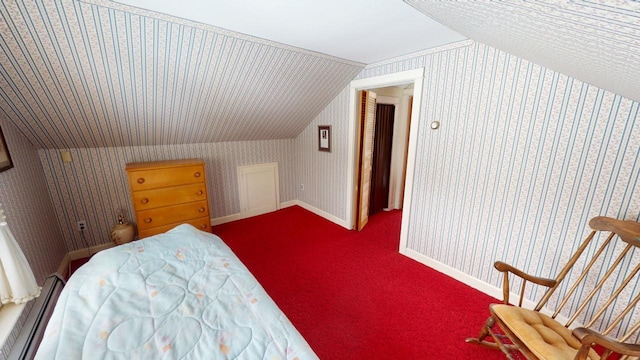 90 E Ter, Millinocket, ME 04462 - bedroom featuring vaulted ceiling, a baseboard heating unit, wallpapered walls, and carpet floors