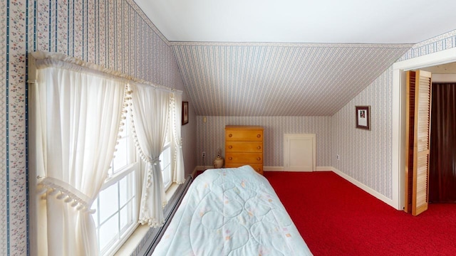 90 E Ter, Millinocket, ME 04462 - bedroom featuring wallpapered walls, lofted ceiling, and carpet flooring