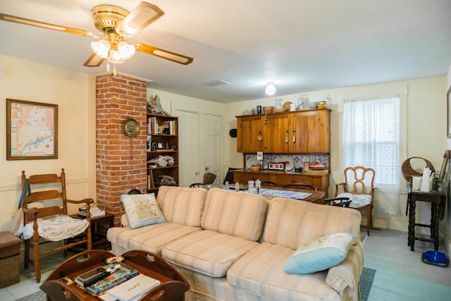 living room with ceiling fan and light hardwood / wood-style floors