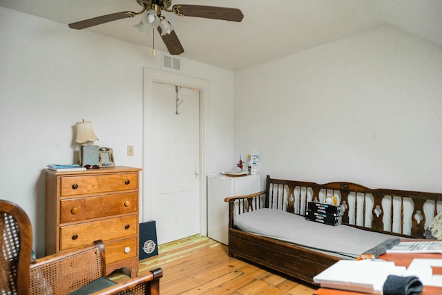 bedroom featuring ceiling fan and light hardwood / wood-style floors