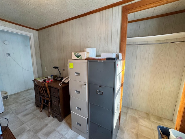 home office with wood walls and crown molding