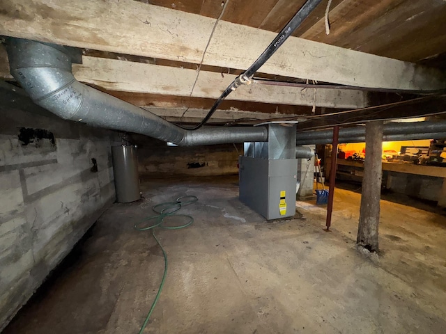 basement with heating unit and water heater