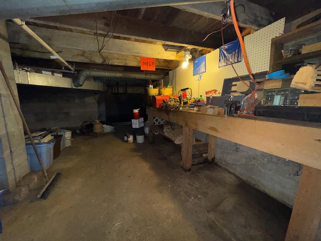 basement with a workshop area