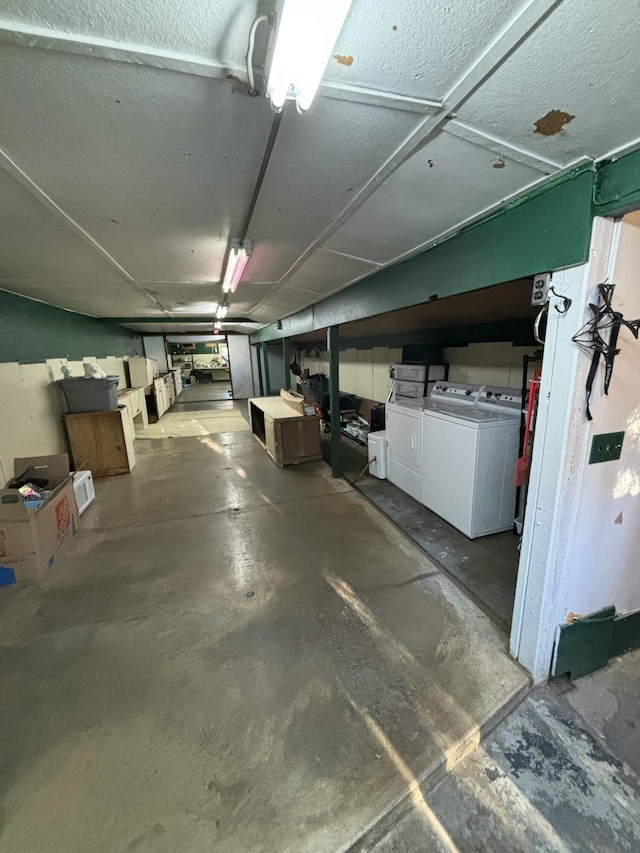 garage featuring washer and dryer