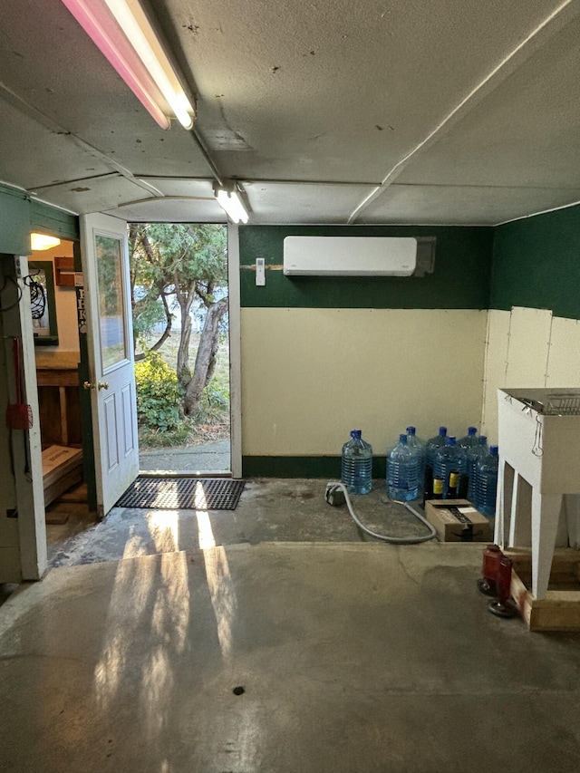 garage with an AC wall unit