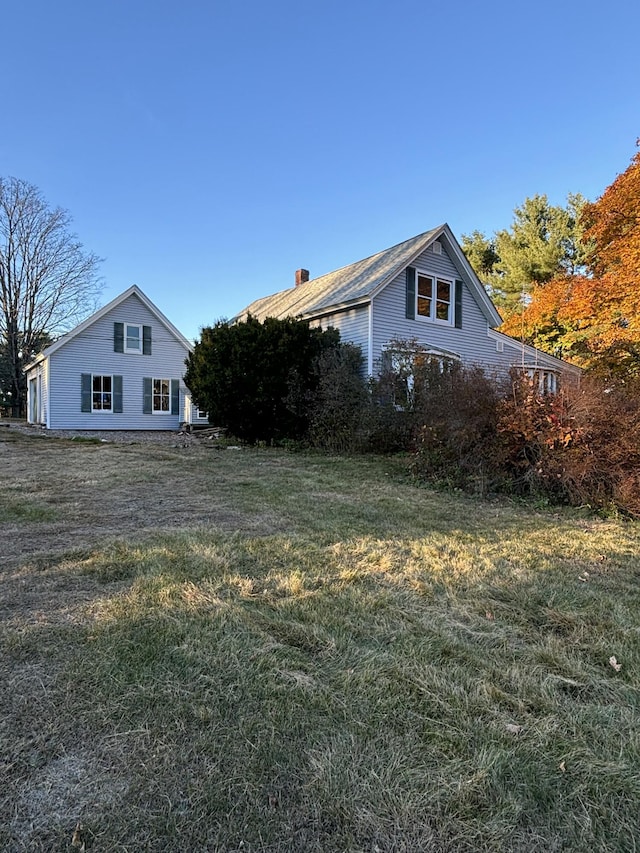 exterior space with a yard